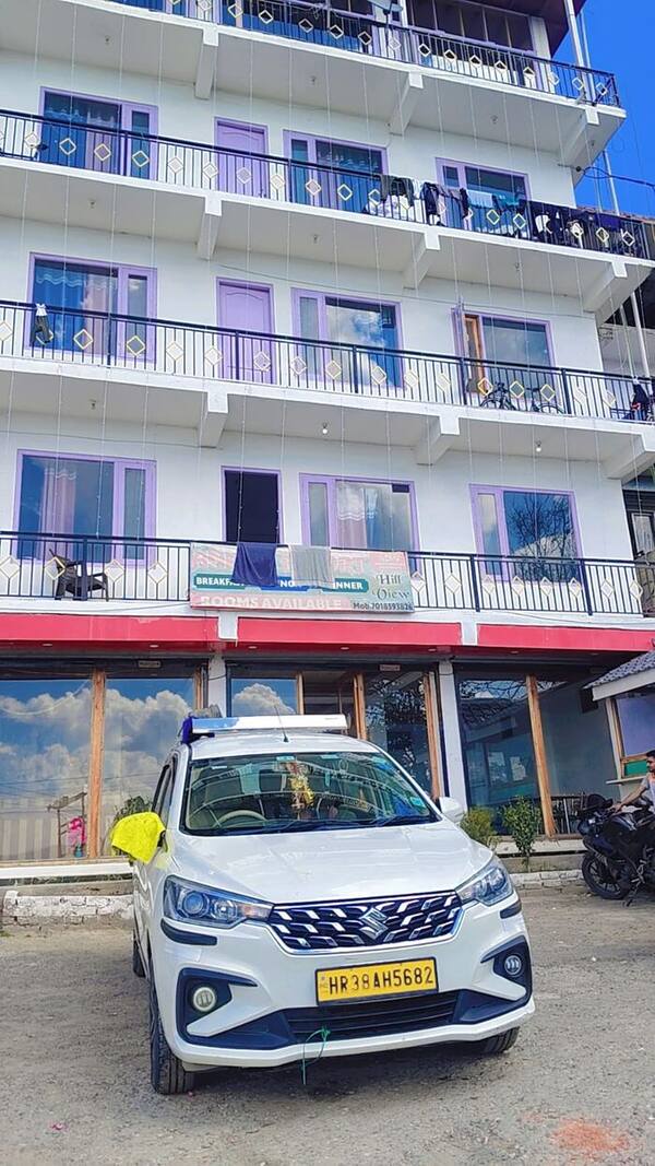 Doorstep pickup at a hill hotel
